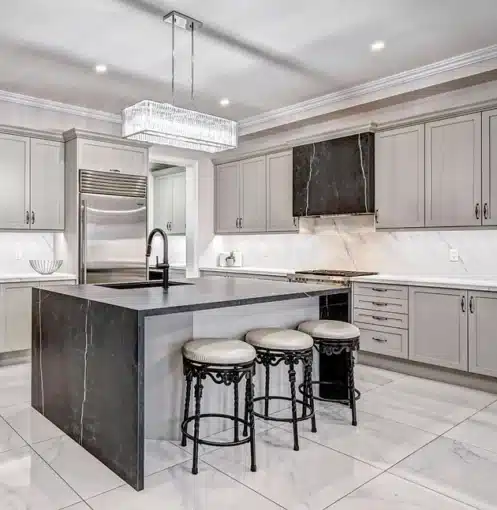 a large kitchen with a center island and three stools