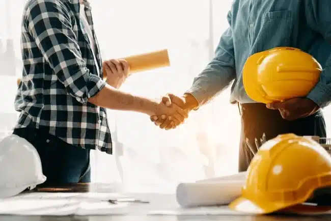 The contractor and client sign the home renovation contract