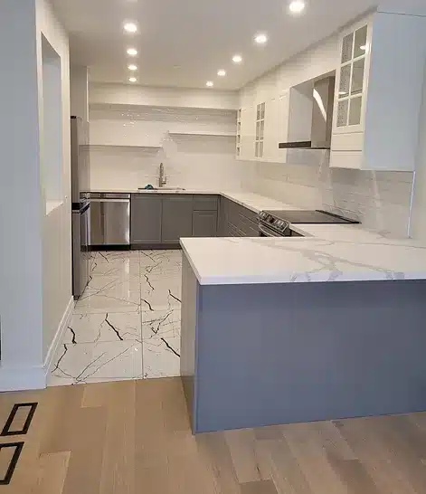 Modern kitchen cabinets with beautiful marble quartz countertop and backsplash