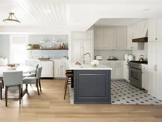 a kitchen with a table and chairs and a stove