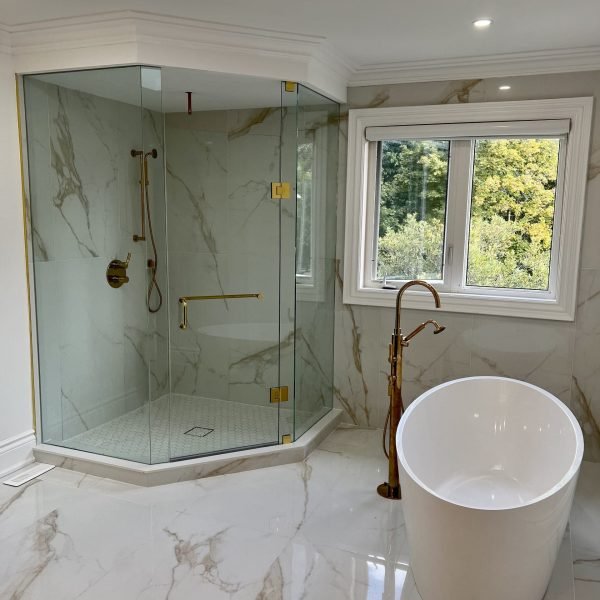 Master Bathroom with big corner shower and golden marble slaps